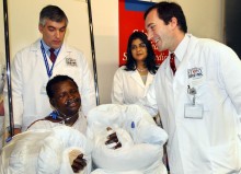 Dr. Alexander Dagum with patient Arsenio Matias, whose hands were successfully reattached by Dr. Dagum and his team. Dr. Alexander Dagum with patient Arsenio Matias, whose hands were reattached.